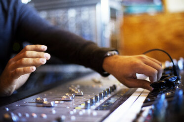 Cropped image of man using sound recording equipment - CAVF07160