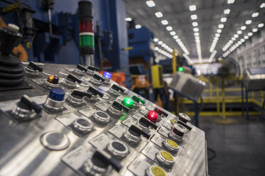 Close-up of buttons on control panel at factory - CAVF07406