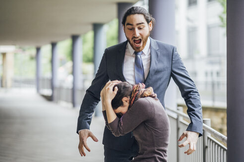 Businessman screaming at woman - JSCF00062