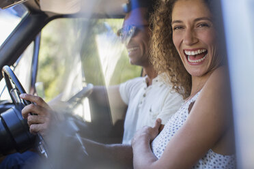 Couple riding in car together - CAIF16711