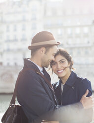 Couple hugging outdoors - CAIF17047