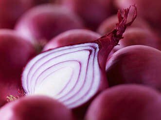 Extreme close up of raw sliced red onion - CAIF17075