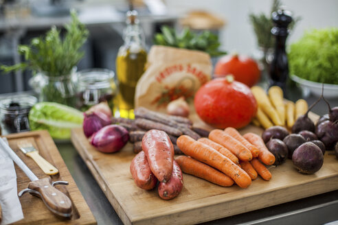 Different fresh vegetables on chopping board - KVF00103