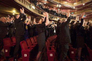 Audience applauding in theater - CAIF18420