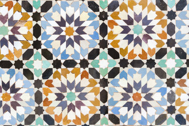 Morocco, Marrakesh, Ben Youssef Madrasa, detail of colorful tiles - TAMF00963