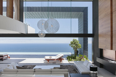 Modern house overlooking ocean - CAIF19011