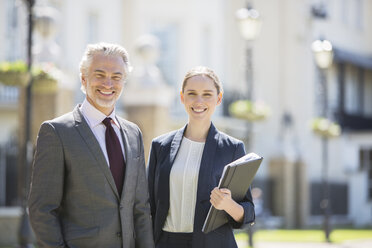 Business people smiling outdoors - CAIF19222