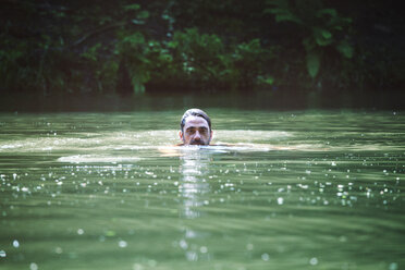 Portrait of man in lake - CAVF09825