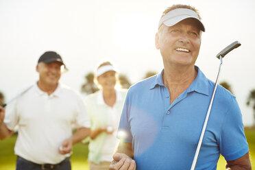 Senior adults on golf course - CAIF19479