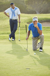 Senior men on golf course - CAIF19536