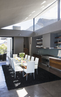 Table and chairs in modern dining room - CAIF19818