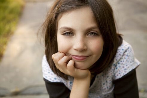 Close-up girl with hand on chin - CAVF10727