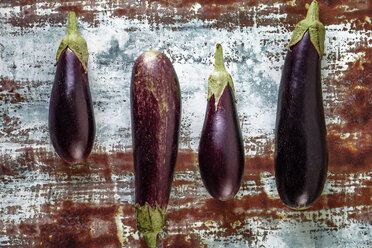 Overhead view of eggplants arranged on table - CAVF11551