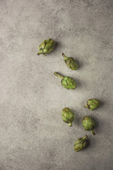 Overhead view of artichokes on slate - CAVF12073