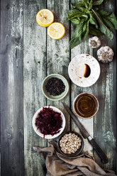 High angle view of various fresh food ingredients on wooden table - CAVF12144