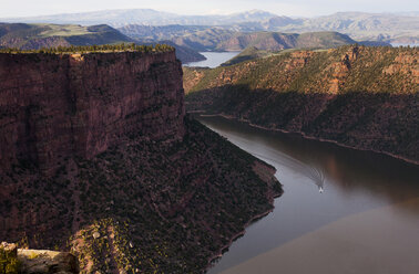 High angle view of boat in river amidst mountains - CAVF12499