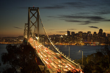 Blurred motion of vehicles on Oakland Bay Bridge at night - CAVF12562