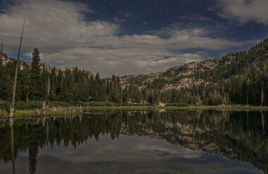 Scenic view of lake and mountains against sky - CAVF13214