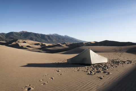 Tent on desert against sky stock photo