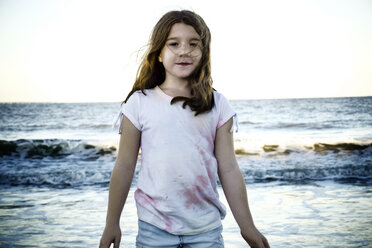 Portrait of cute girl standing against sea - CAVF15201