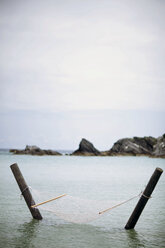 Hammock over sea against sky - CAVF16148