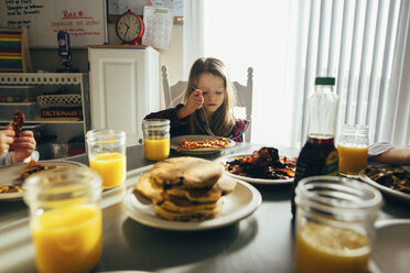 Girl eating breakfast at home - CAVF16215