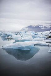 Scenic view of Jokulsarlon against cloudy sky - CAVF16273