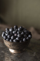 Close-up of blueberries in bowl on table - CAVF16933