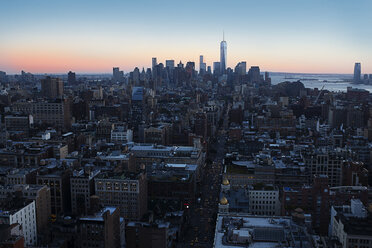One World Trade Center amidst cityscape during sunset - CAVF17264