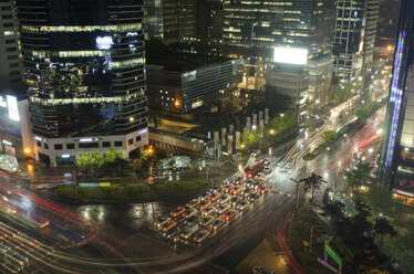 Illuminated cars on city street - CAVF17340