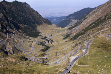 High angle view of winding roads against mountains - CAVF17858