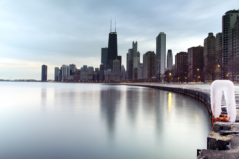 Cityscape by Lake Michigan against sky stock photo