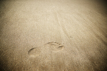 High angle view of foot mark on sand at beach - CAVF22745