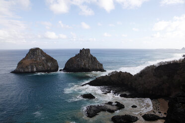 Scenic view of rock formations in sea at Fernando de Noronha against sky - CAVF23045