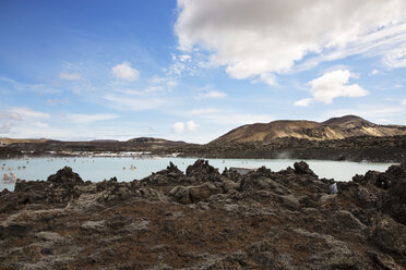 Scenic view of lake amidst mountain against sky - CAVF23353