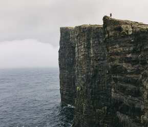 Rock formations in sea against cloudy sky - CAVF23589