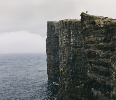 Rock formations in sea against cloudy sky - CAVF23589