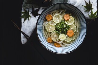 Overhead view of noodle soup served in bowl on table - CAVF24281