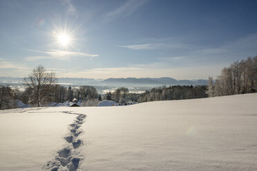 Germany, Bavaria, Eurasburg, View to Loisach Valley, footmarks in winter - LHF00549