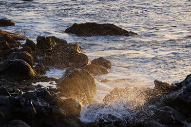 Spain, Canary Islands, La Gomera, surf at sunset - SIEF07750