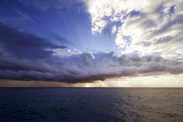 Cloudy sky over seascape during sunset - CAVF24950