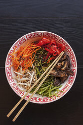 Overhead view of sesame noodles served on table - CAVF25180