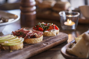 Close-up of bruschettas served on table - CAVF25181