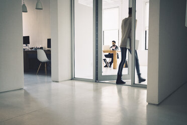 Businesswoman entering in office - CAVF25618