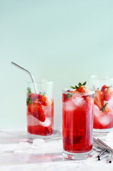 Juice on marble table against blue wall - CAVF26604