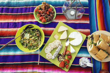 Overhead view of food on picnic blanket - CAVF26668