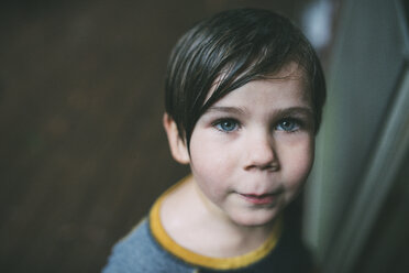 High angle portrait of confident boy at home - CAVF26687