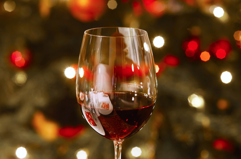 Glass of red wine at Christmas time, close-up stock photo