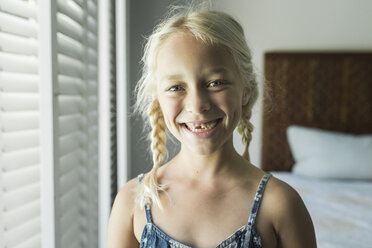 Portrait of happy girl at home - CAVF26992