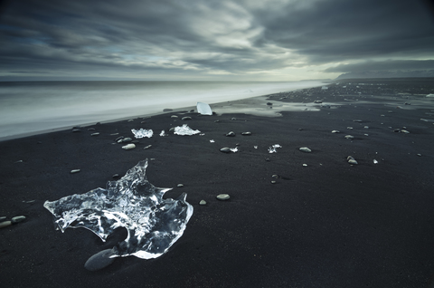 Iceland, pieces of ice at Jokulsarlon beach stock photo